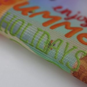 Close up view of the material used in 9 oz heavy duty oversized mesh banner.